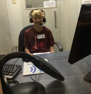 Boy Recording his Book