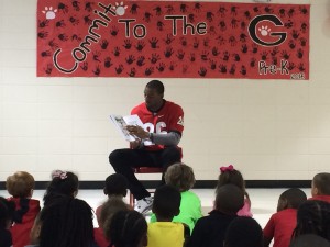 Malcolm in Jersey Reading to Kids