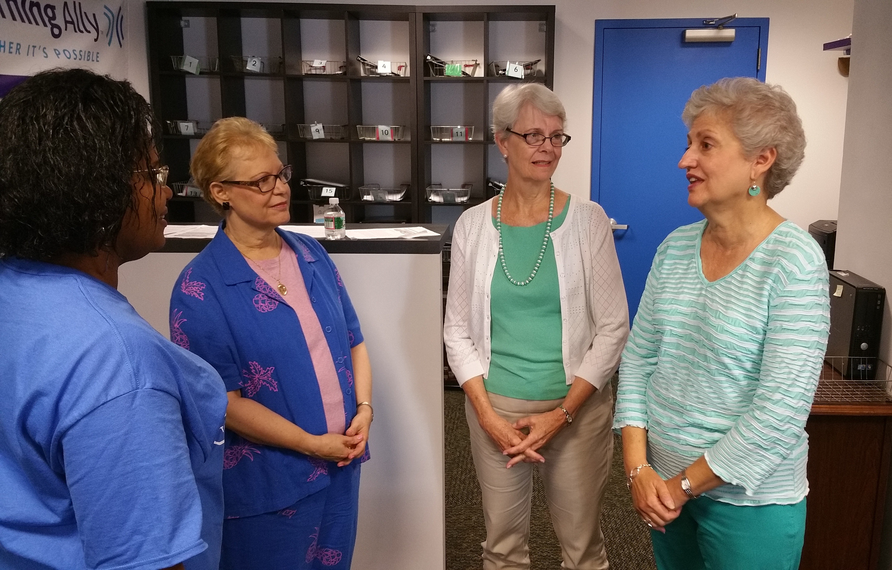 Volunteers Sue Ann Vajda, Pamela Ramsden, and Barbara Mavro help create audiobooks for students who are blind or dyslexic.