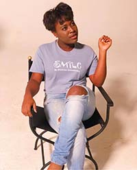 Mojena Sitting on a Director's Chair