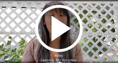 Video of Volunteer sharing a positive word with our students
